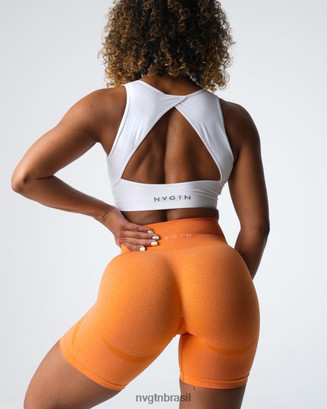 NVGTN fitness mulheres shorts sem costura com contorno pôr do sol laranja NNJ66L332